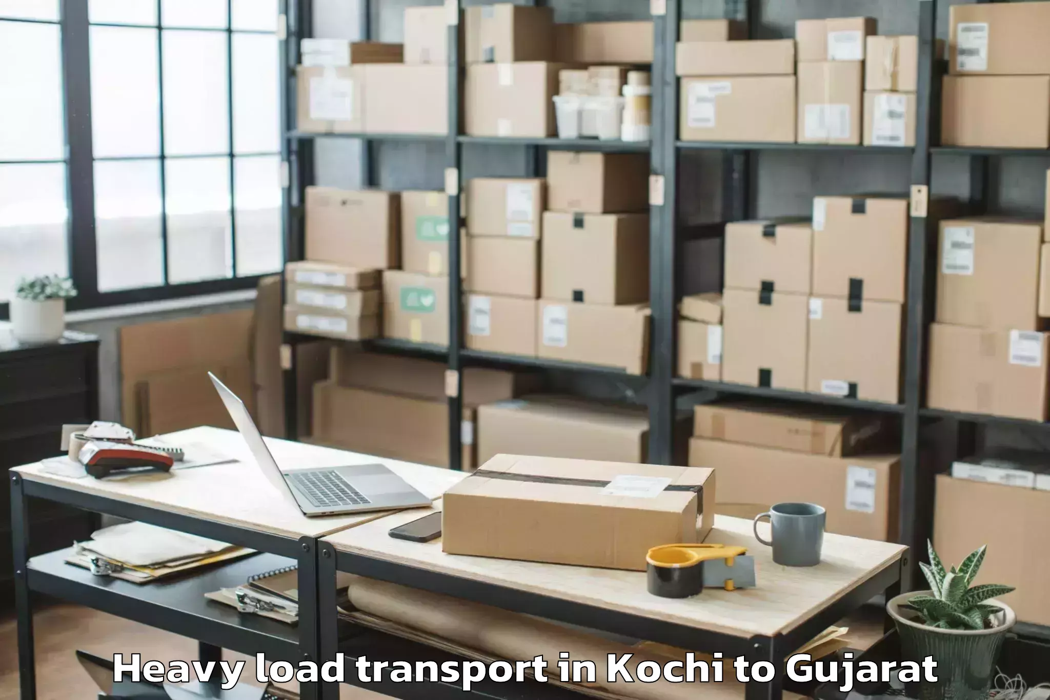 Hassle-Free Kochi to Gujarat National Law Universit Heavy Load Transport